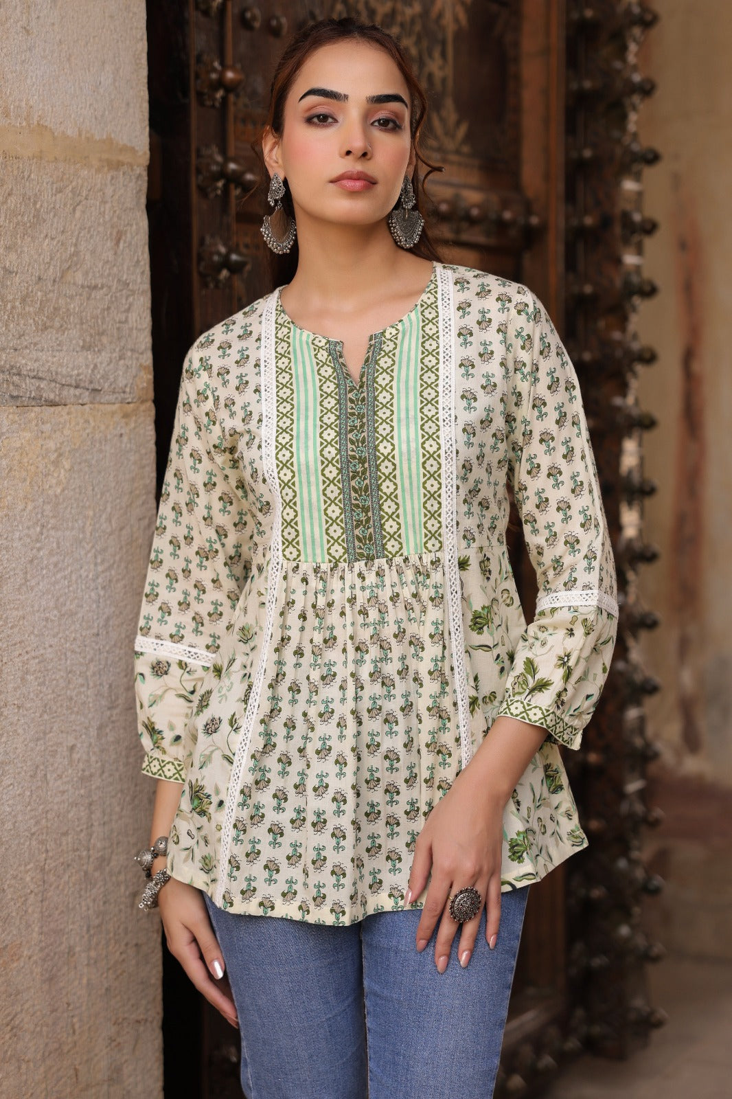 Cream and Green Printed Ethnic Peplum Top