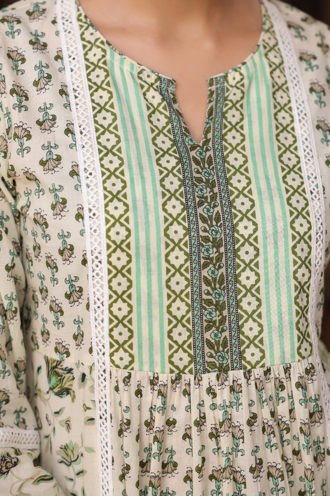 Cream and Green Printed Ethnic Peplum Top