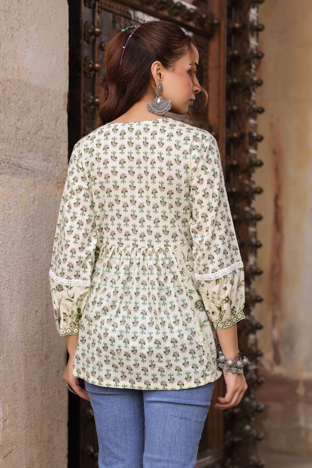 Cream and Green Printed Ethnic Peplum Top