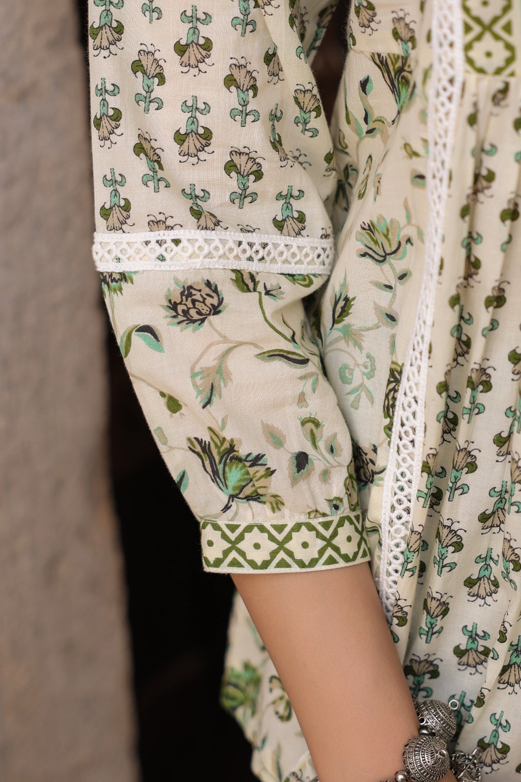 Cream and Green Printed Ethnic Peplum Top