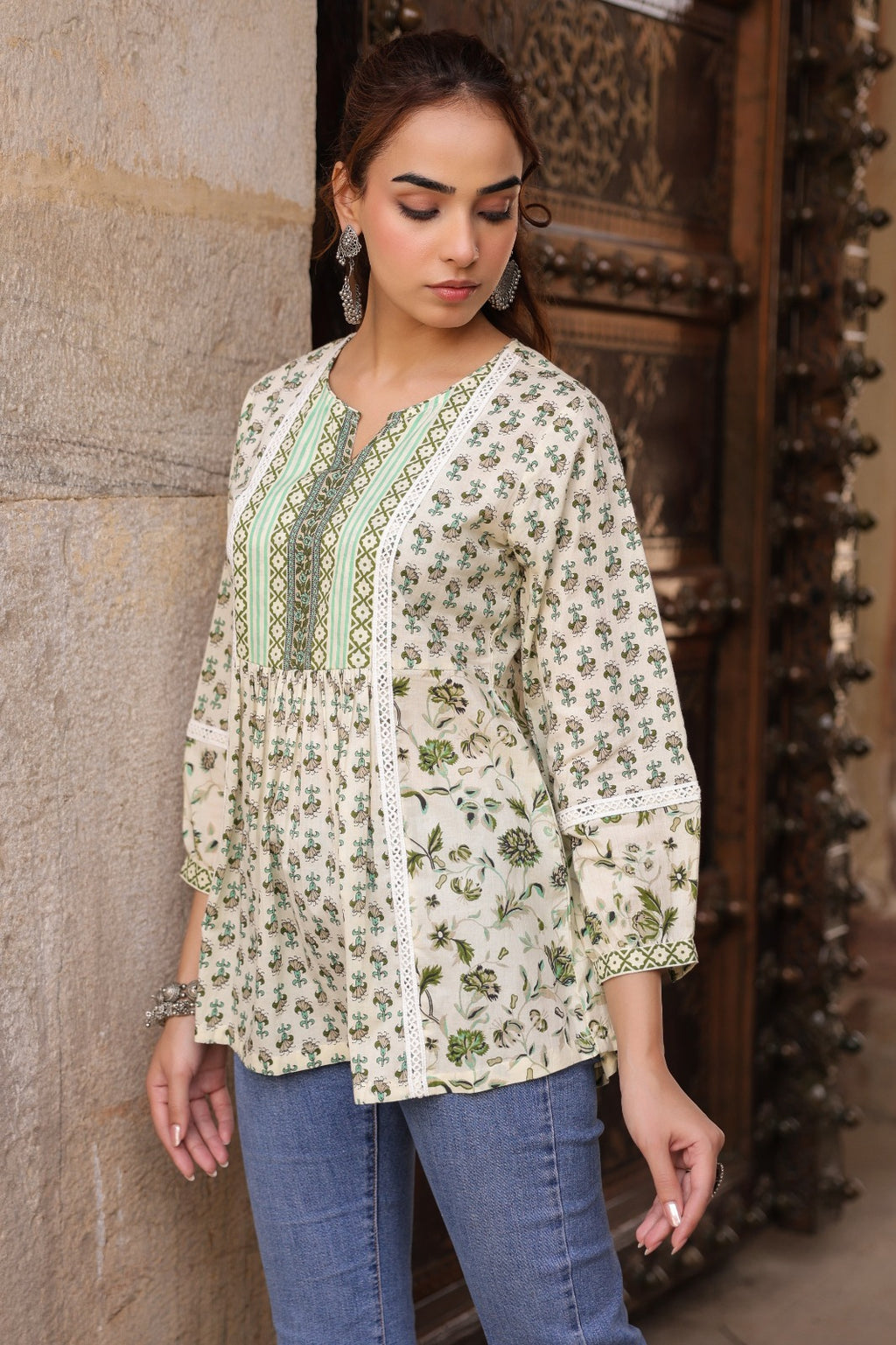 Cream and Green Printed Ethnic Peplum Top